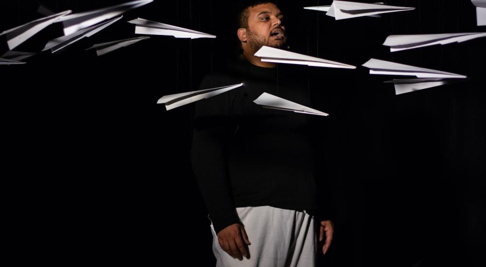Paper aeroplanes flying around Pankaj Tiwari's head