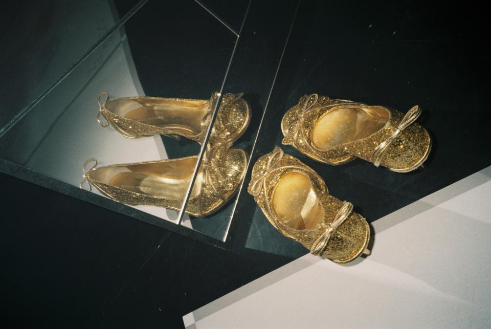 pair of golden high heel shoes