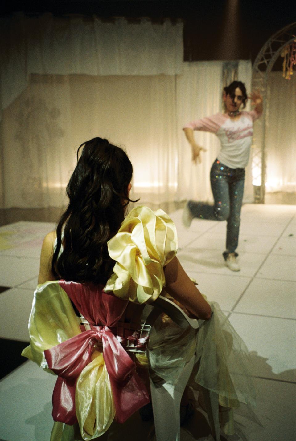 2 dancing performers