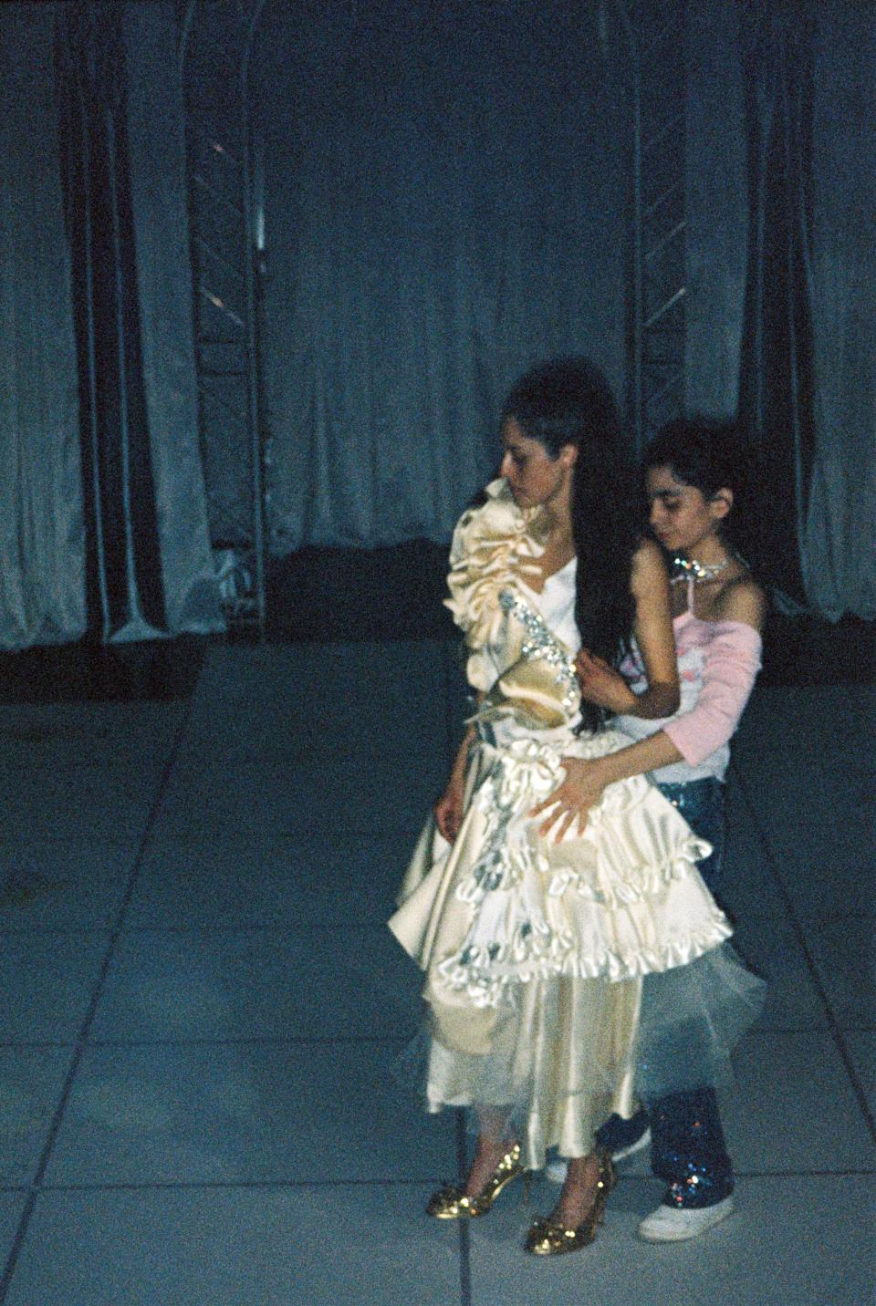 2 dancing performers