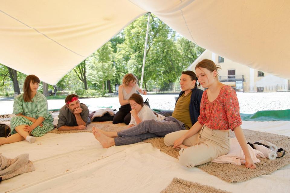 People under a tent 